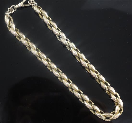An early 20th century engraved 9ct gold fancy link choker chain, 37.3 grams.
